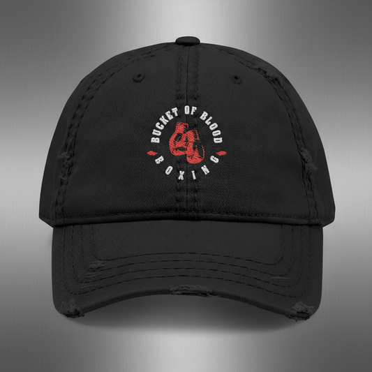 Embroidered 'Bucket of Blood' baseball cap, distressed dad hat with low-profile crown, frayed edges, and compact front embroidery