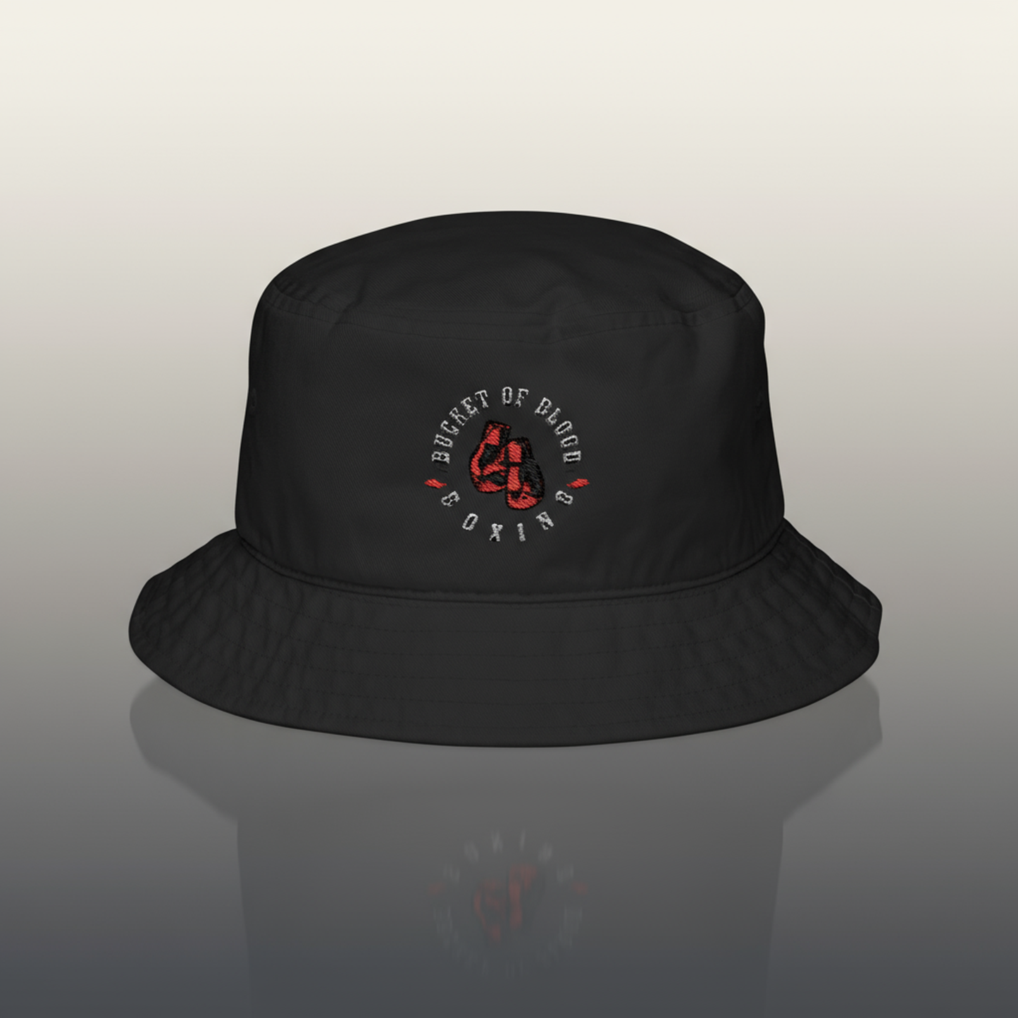Bucket hat with vintage embroidered emblem, low crown and modest brim, trendy streetwear cap for everyday casual style