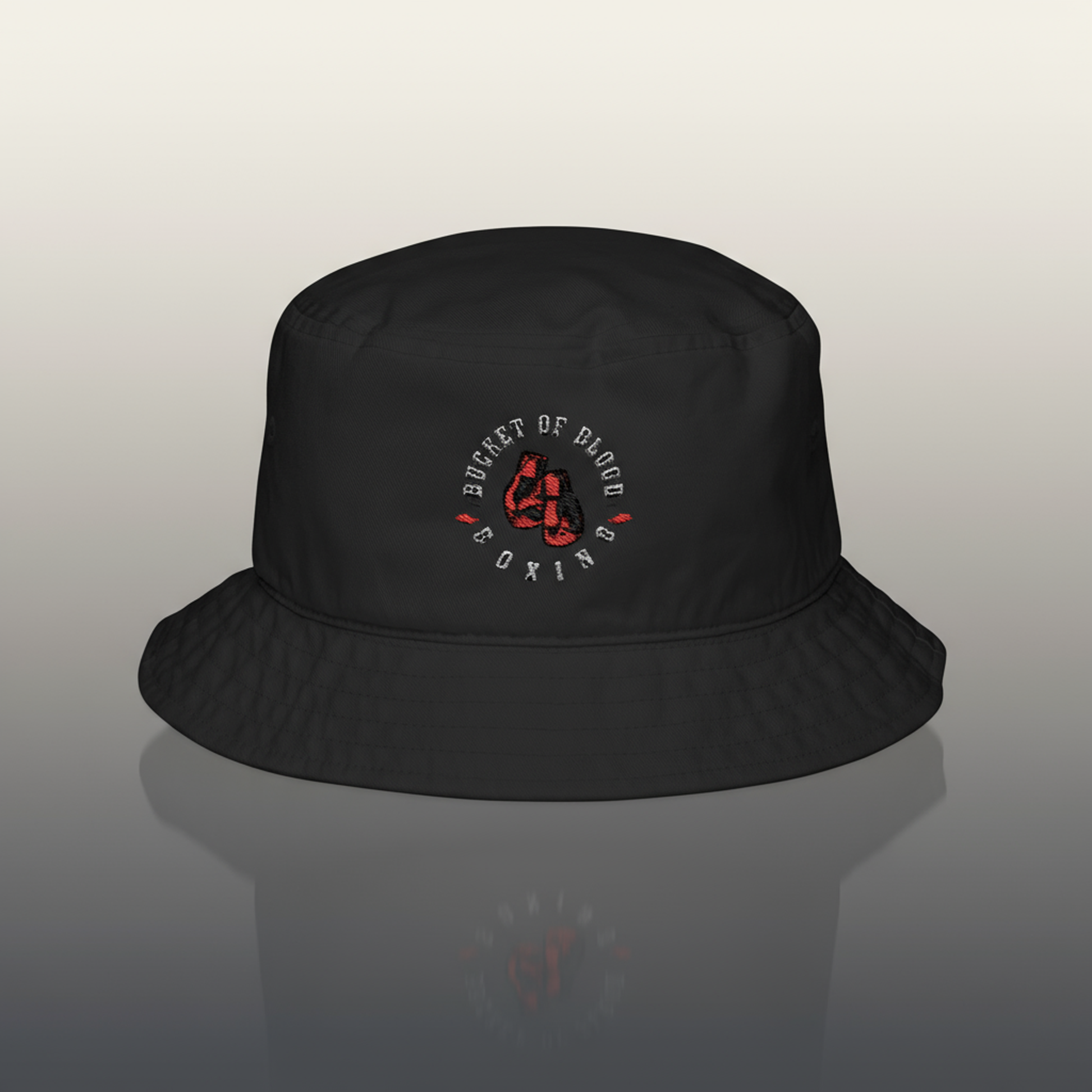 Bucket hat with vintage embroidered emblem, low crown and modest brim, trendy streetwear cap for everyday casual style