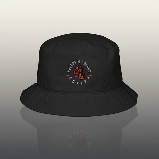 Bucket hat with vintage embroidered emblem, low crown and modest brim, trendy streetwear cap for everyday casual style
