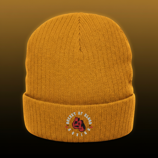 “Bucket of Blood” logo beanie hat in ribbed knit with embroidered skull emblem, warm and stylish streetwear accessory